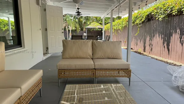 a living room with furniture and a table