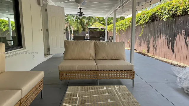 a living room with furniture and a table
