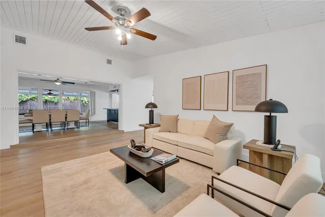 a kitchen with stainless steel appliances granite countertop a stove sink and cabinets