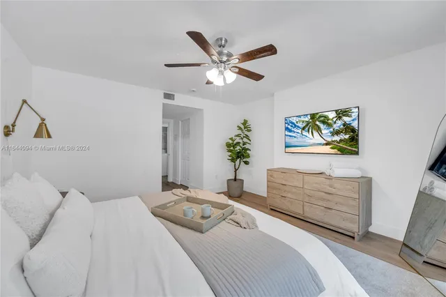a view of a house with pool and a yard