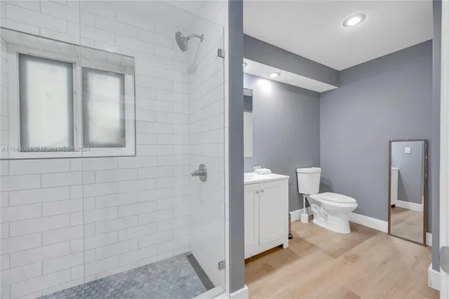 a view of a patio with a table and chairs