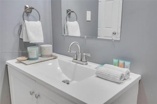 a view of a patio with couches and a table and chairs