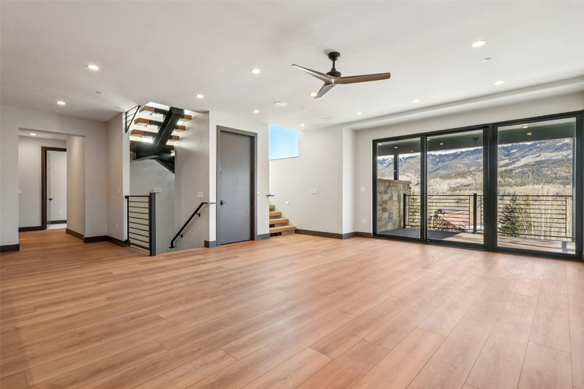 1325 Golden Eagle Road Silverthorne, CO 80498 - Photo 12 of 42 covered deck, elevator, staircase