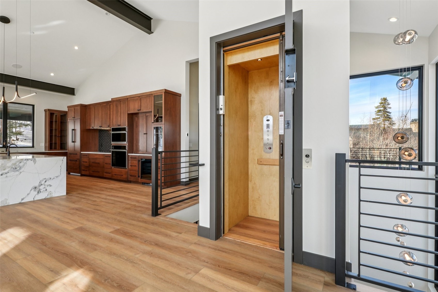 1325 Golden Eagle Road Silverthorne, CO 80498 - Photo 24 of 41 view of elevator, kitchen