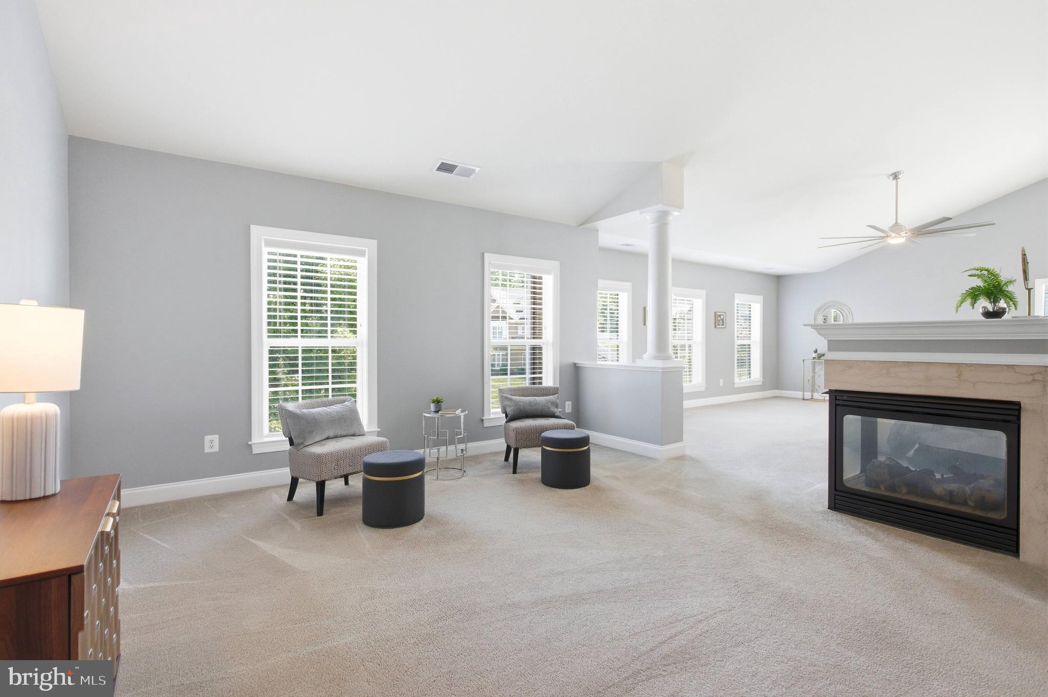 18475 Kerill Road Triangle, VA 22172 - Photo 79 of 99 a living room with furniture and a fireplace
