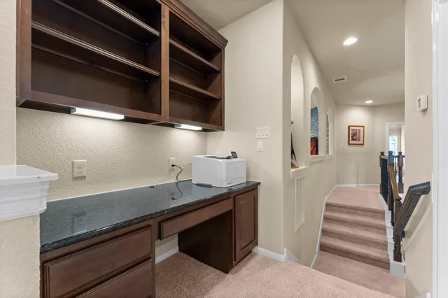 a view of entryway and kitchen