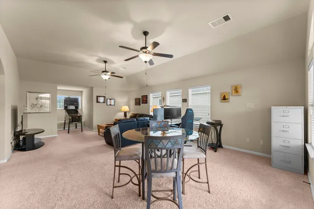a view of a livingroom and a dining room