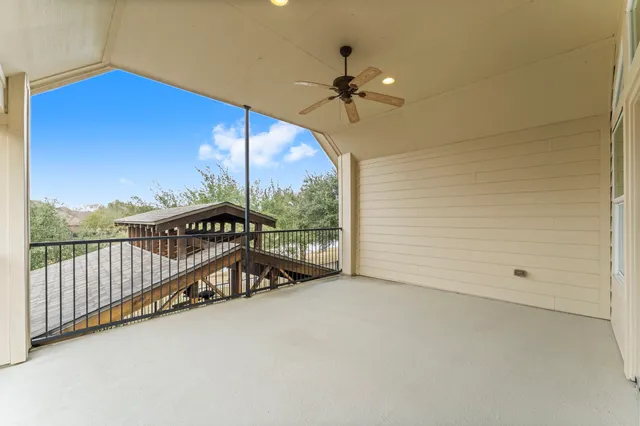 a view of empty room with fan