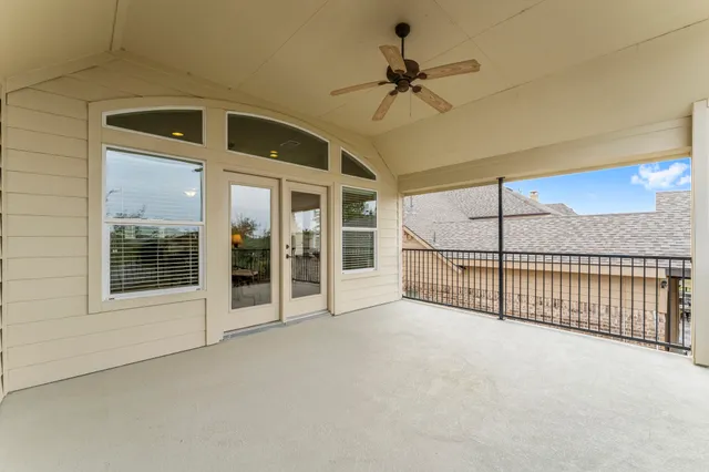 a view of a backyard with sitting area