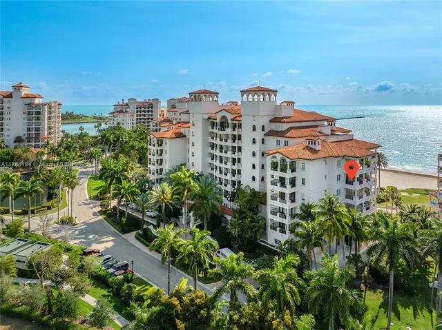 a view of lake with building in front of it