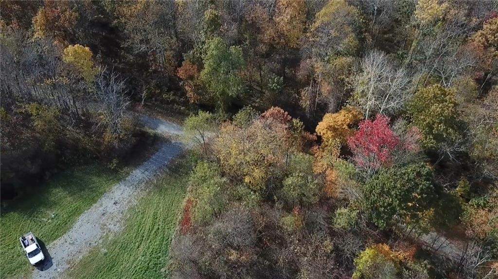 1091 Blackhawk Road Beaver Falls, PA 15010 - Photo 15 of 18 a view of a lake with a house