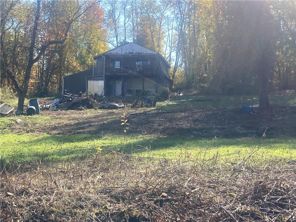 1091 Blackhawk Road Beaver Falls, PA 15010 - Photo 9 of 18 a view of a yard in front of a house