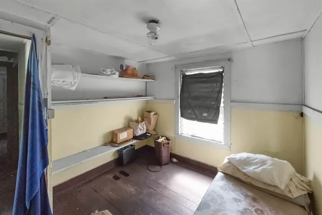 a room with furniture and a window