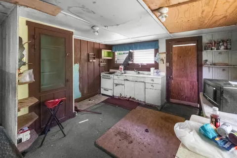 a room with furniture and a rug