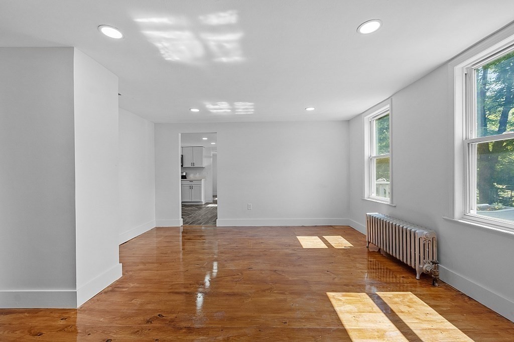 197 Beaman Road Sterling, MA 01564 - Photo 16 of 39 a view of an empty room with a window