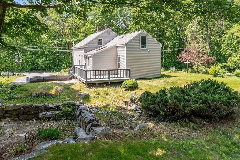 197 Beaman Road Sterling, MA 01564 - Photo 32 of 39 a house view with a garden space