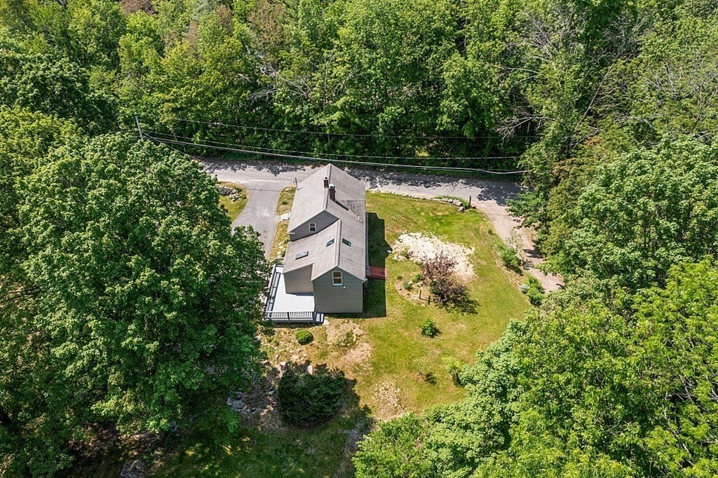 197 Beaman Road Sterling, MA 01564 - Photo 33 of 39 an aerial view of a house with swimming pool and garden view