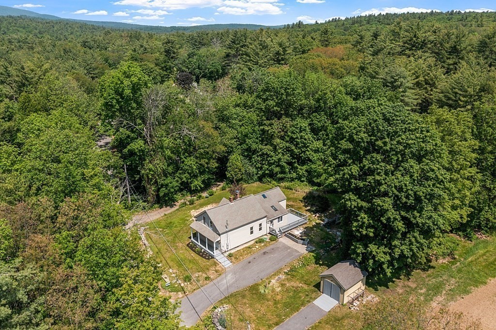 197 Beaman Road Sterling, MA 01564 - Photo 35 of 39 an aerial view of a house with a yard