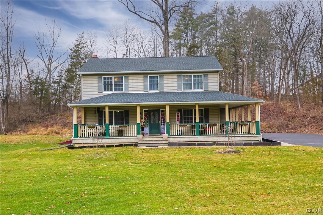 5873 Cherry Valley Road Stroudsburg, PA 18360 - Photo 1 of 36 a front view of a house with swimming pool
