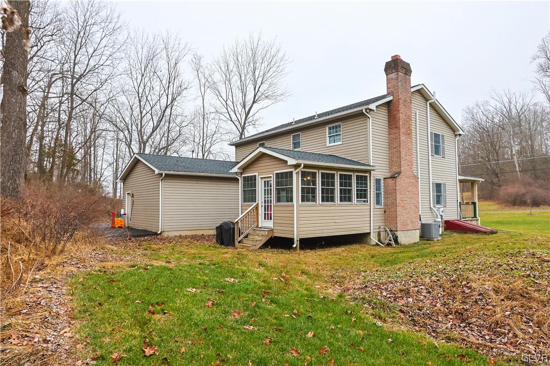 5873 Cherry Valley Road Stroudsburg, PA 18360 - Photo 33 of 36 a house view with a garden space