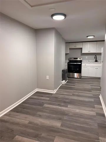 a view of kitchen and microwave