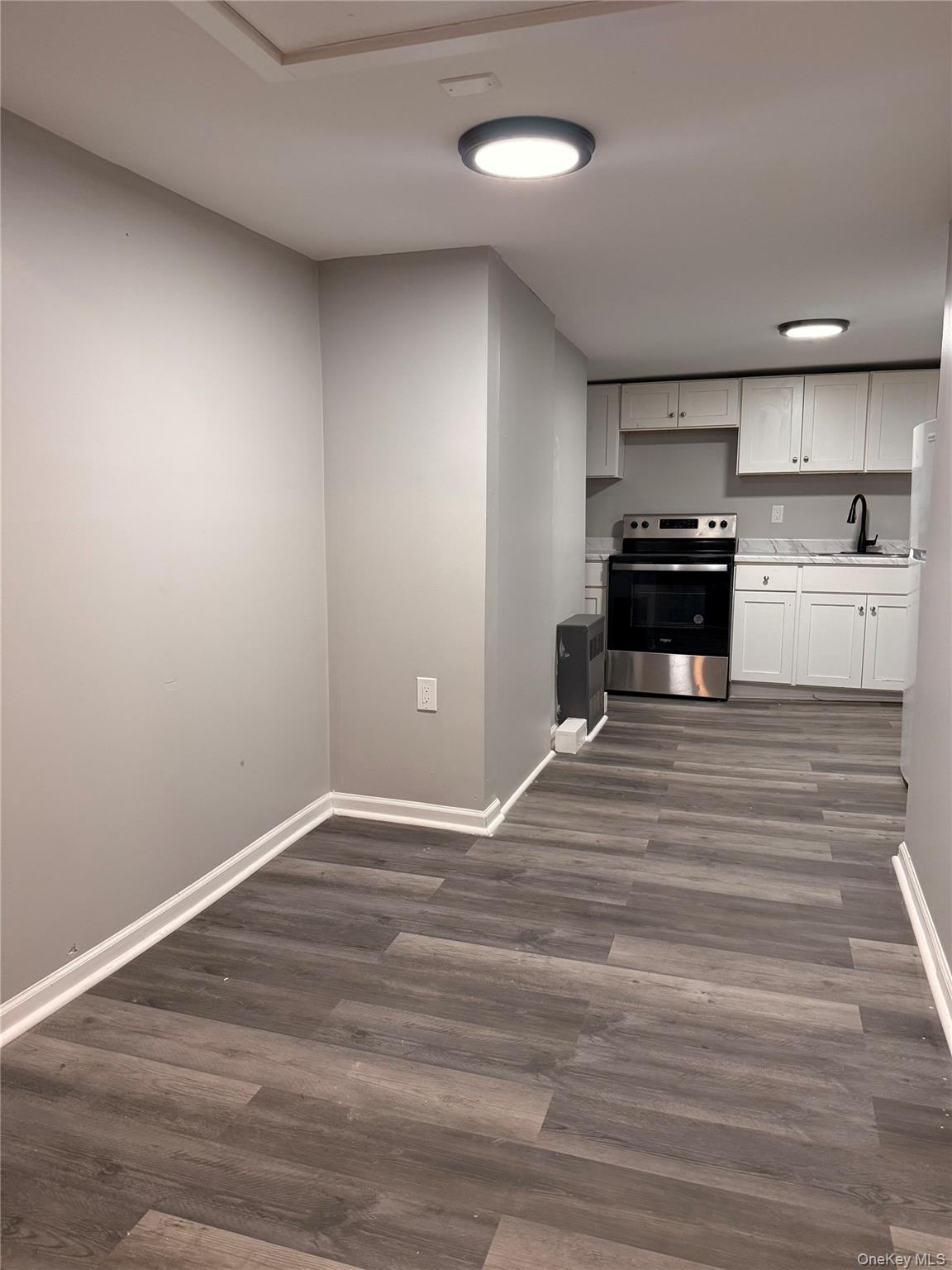 7 Grant Street, Unit 2 Poughkeepsie, NY 12601 - Photo 2 of 13 a view of kitchen and microwave