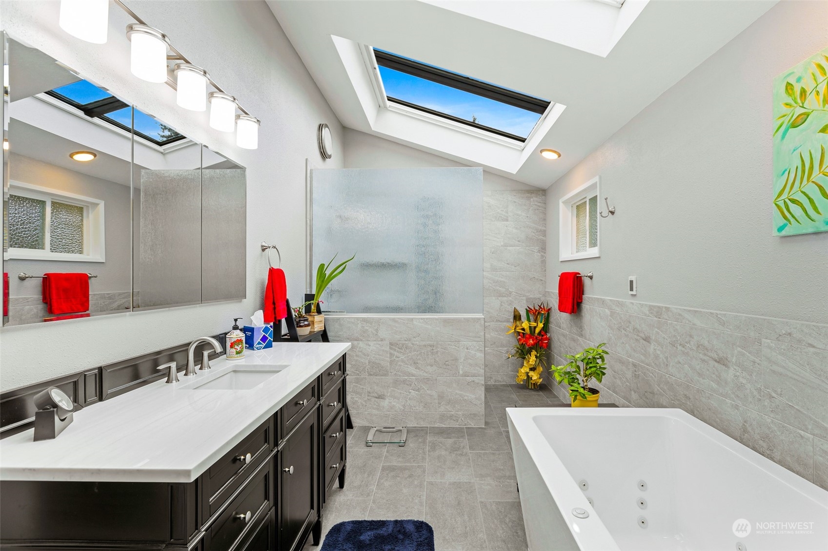 17220 7th Avenue West Bothell, WA 98012 - Photo 17 of 35 a bathroom with a sink vanity mirror and tub