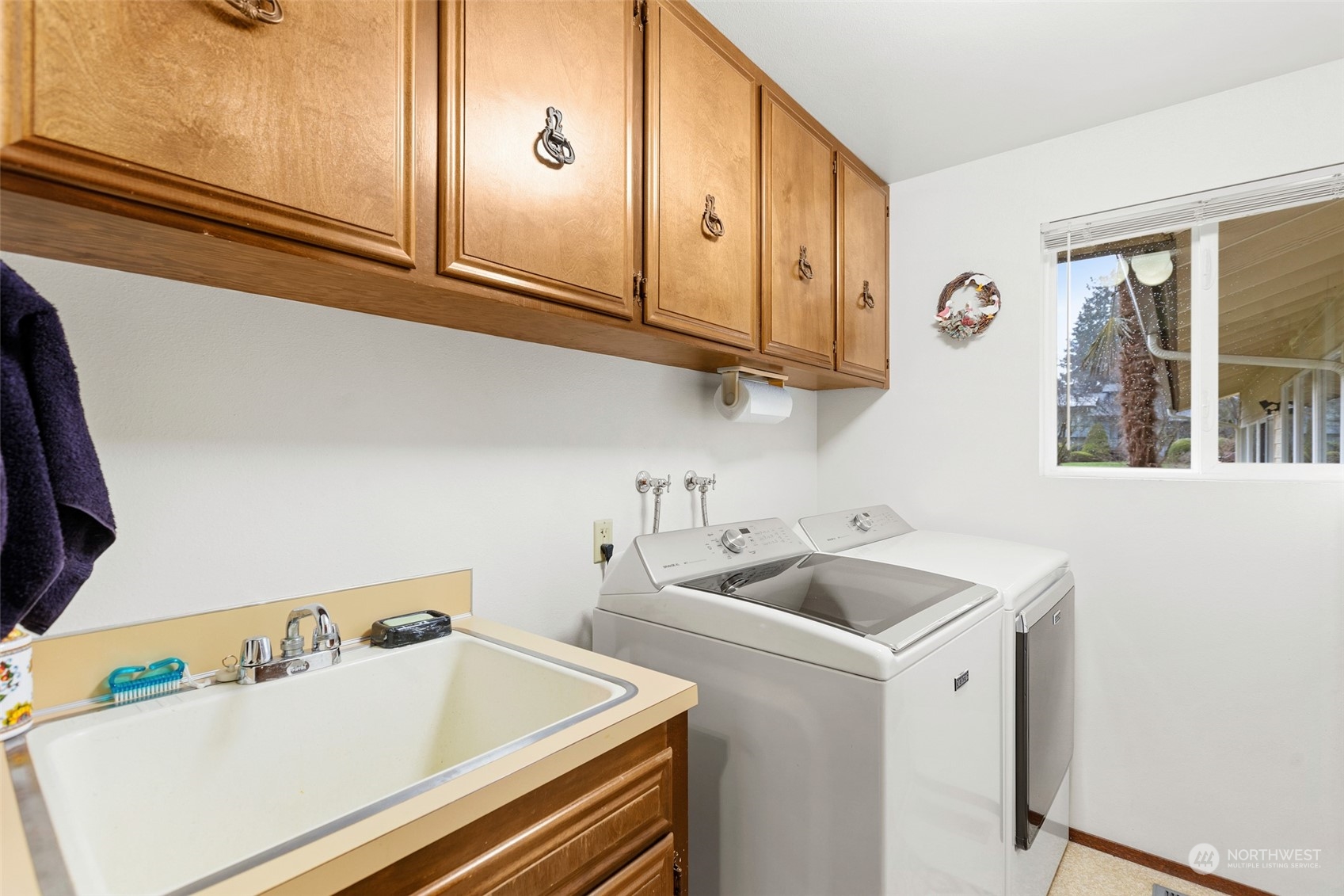 17220 7th Avenue West Bothell, WA 98012 - Photo 18 of 35 a kitchen with a sink cabinets and appliances