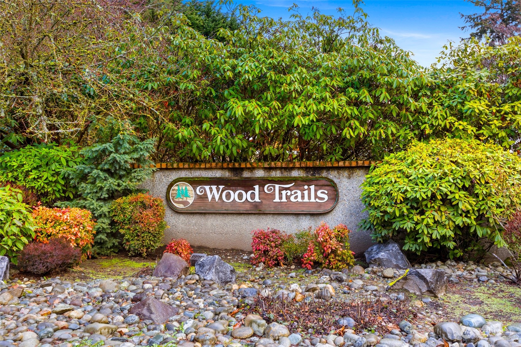 17220 7th Avenue West Bothell, WA 98012 - Photo 31 of 35 a sign broad in front of flowers