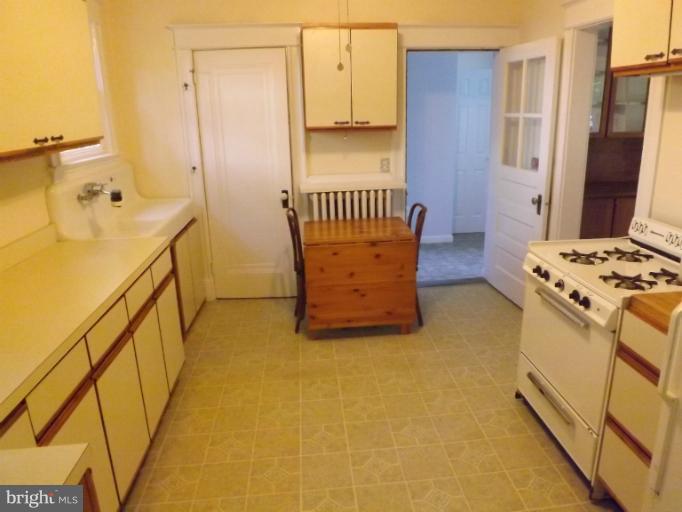 2015 Glen Ross Road Silver Spring, MD 20910 - Photo 23 of 28 Kitchen with two pantries, gas oven & refrigerator