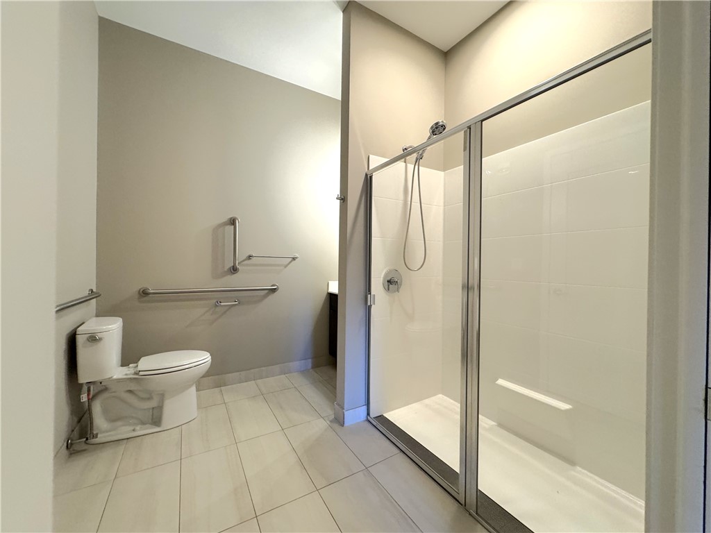 625 South Goodman Street, Unit 111 Rochester, NY 14620 - Photo 8 of 21 Bedroom #1's bathroom with modern step-in shower a