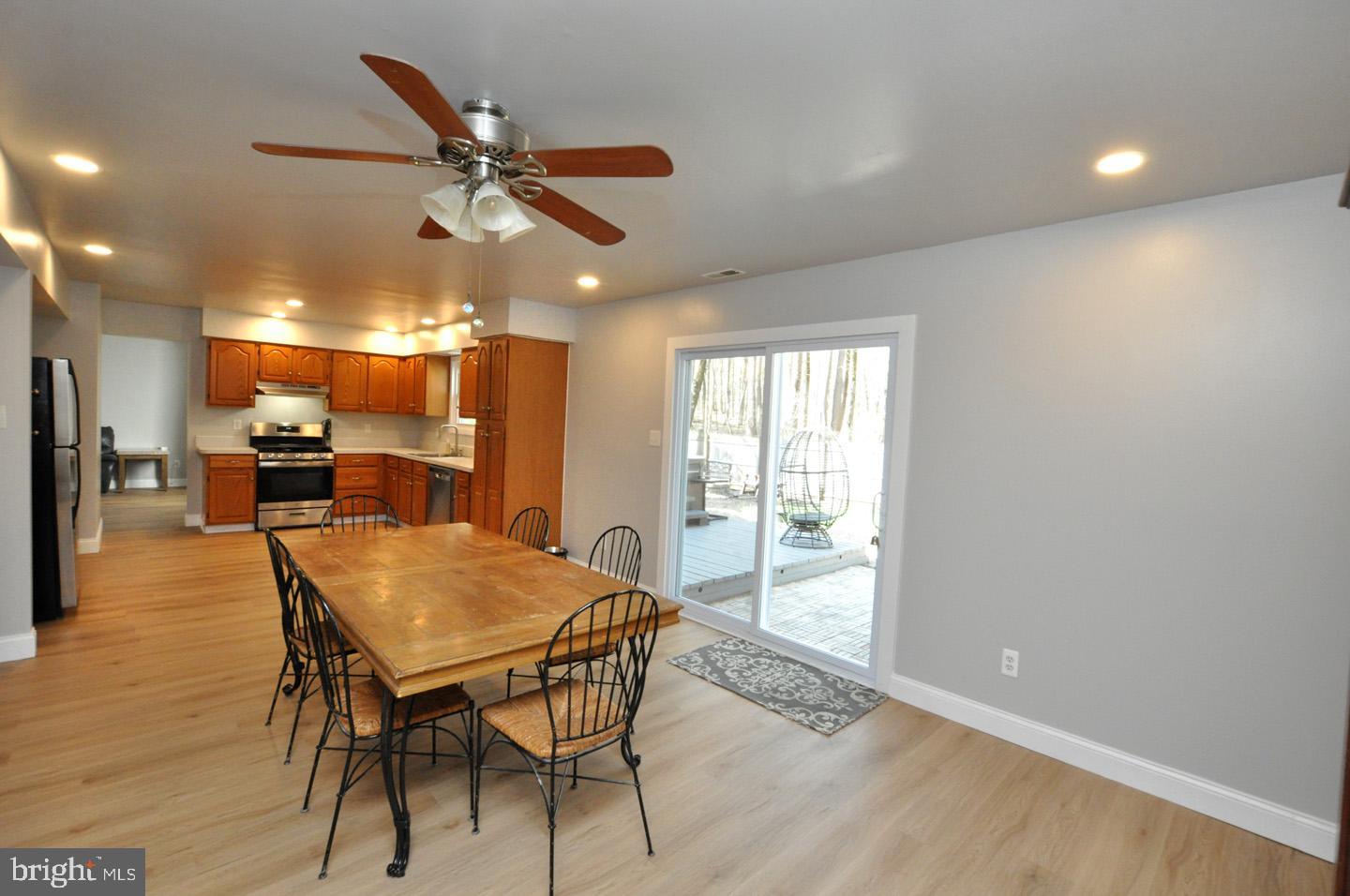 45 Sherri Way Pine Hill, NJ 08021 - Photo 11 of 31 a view of a dining room with furniture window and wooden floor