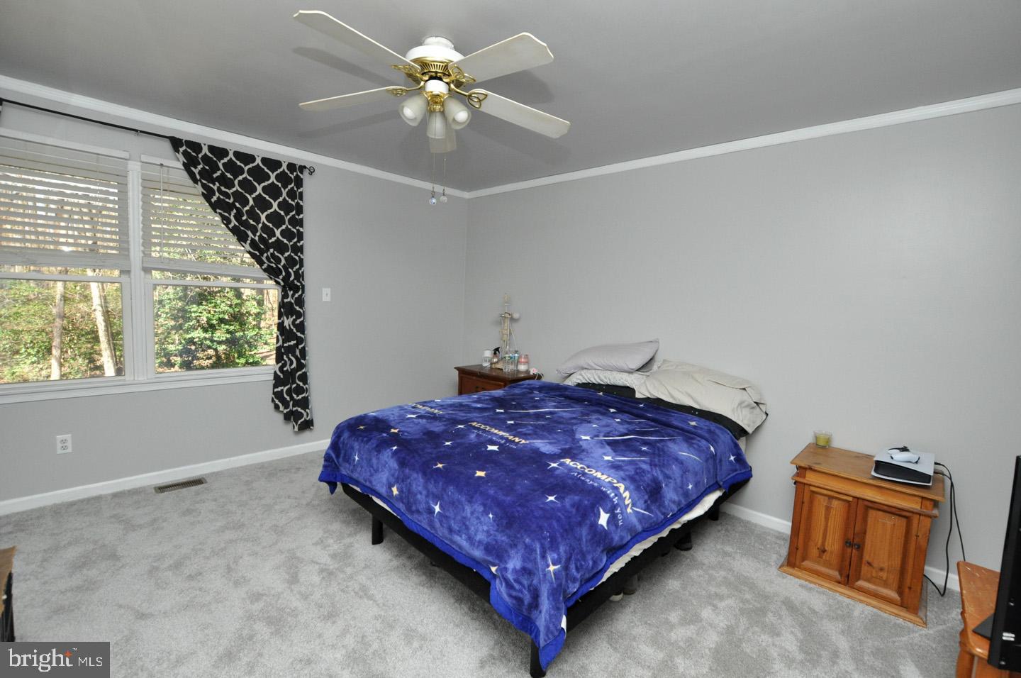 45 Sherri Way Pine Hill, NJ 08021 - Photo 14 of 31 a bed sitting in a room next to a window
