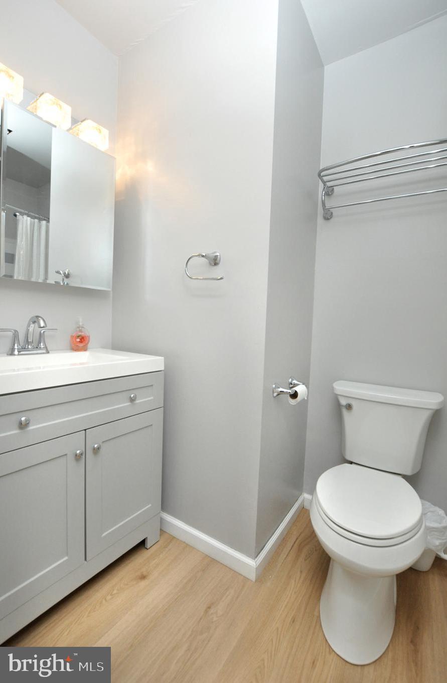 45 Sherri Way Pine Hill, NJ 08021 - Photo 23 of 31 a bathroom with a toilet sink and vanity