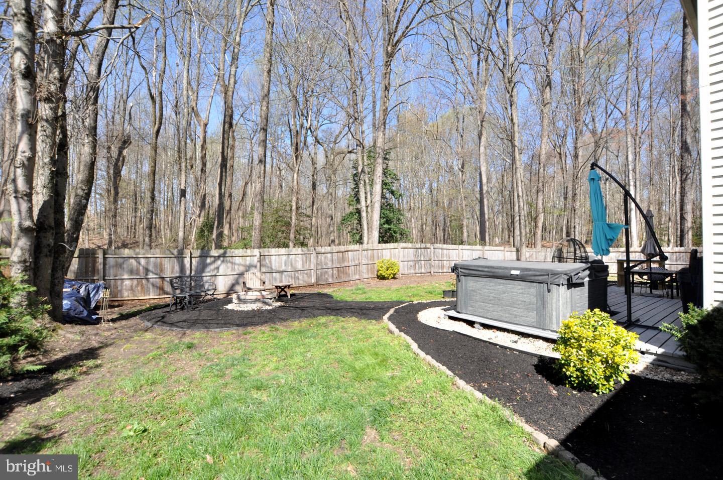 45 Sherri Way Pine Hill, NJ 08021 - Photo 24 of 31 a view of a garden with a bench