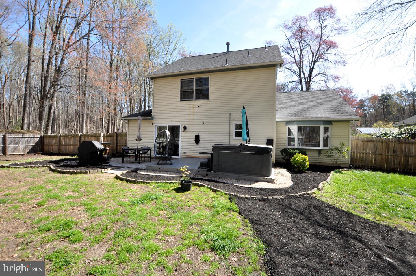45 Sherri Way Pine Hill, NJ 08021 - Photo 26 of 31 a view of a patio with couches chairs and a fire pit