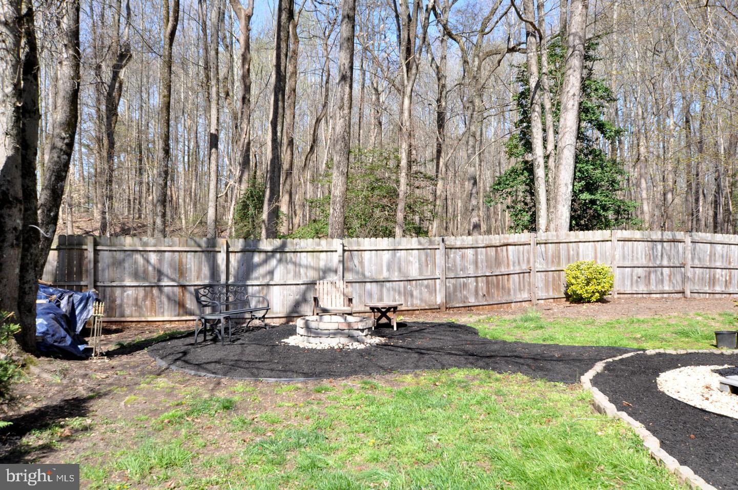 45 Sherri Way Pine Hill, NJ 08021 - Photo 28 of 31 a backyard of a house with table and chairs