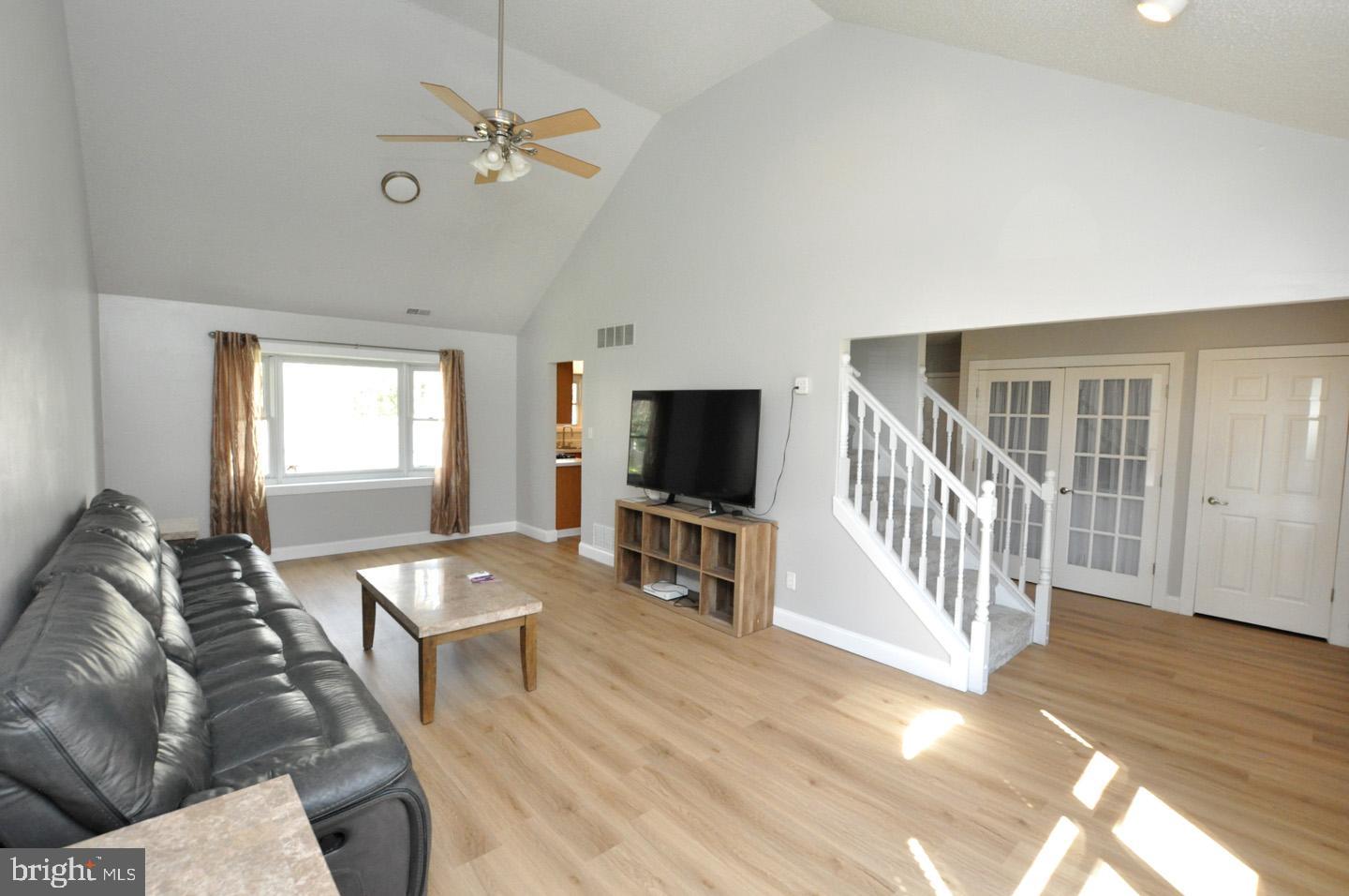 45 Sherri Way Pine Hill, NJ 08021 - Photo 4 of 31 a living room with furniture and a flat screen tv