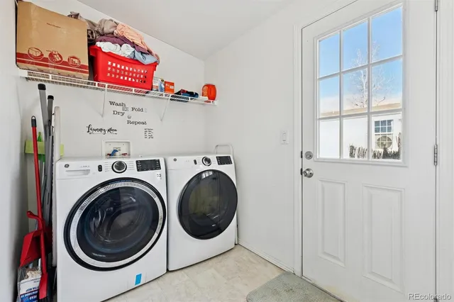 a utility room with dryer and washer
