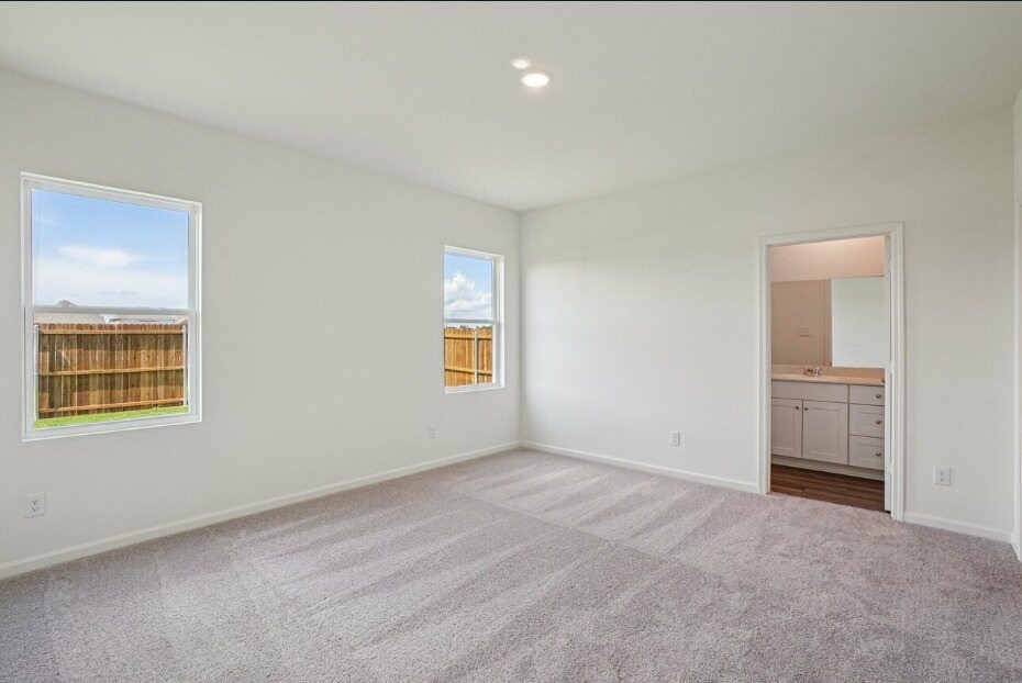 9356 Beryl Lane Conroe, TX 77303 - Photo 5 of 10 a view of an empty room with a window