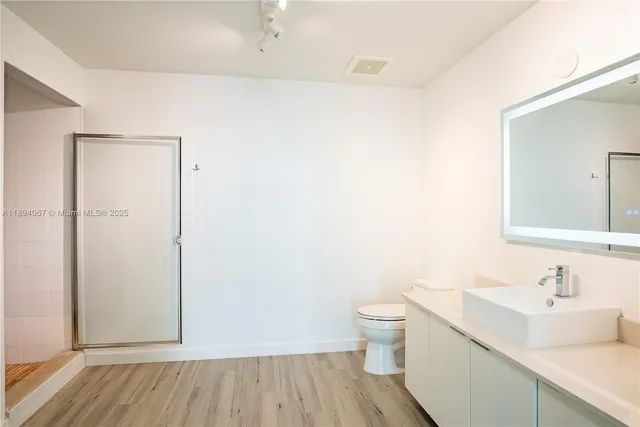 a bathroom with a sink and a toilet