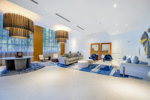 a living room with furniture and a couch