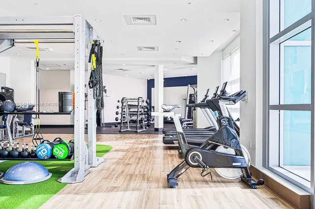 a view of a room with gym equipment