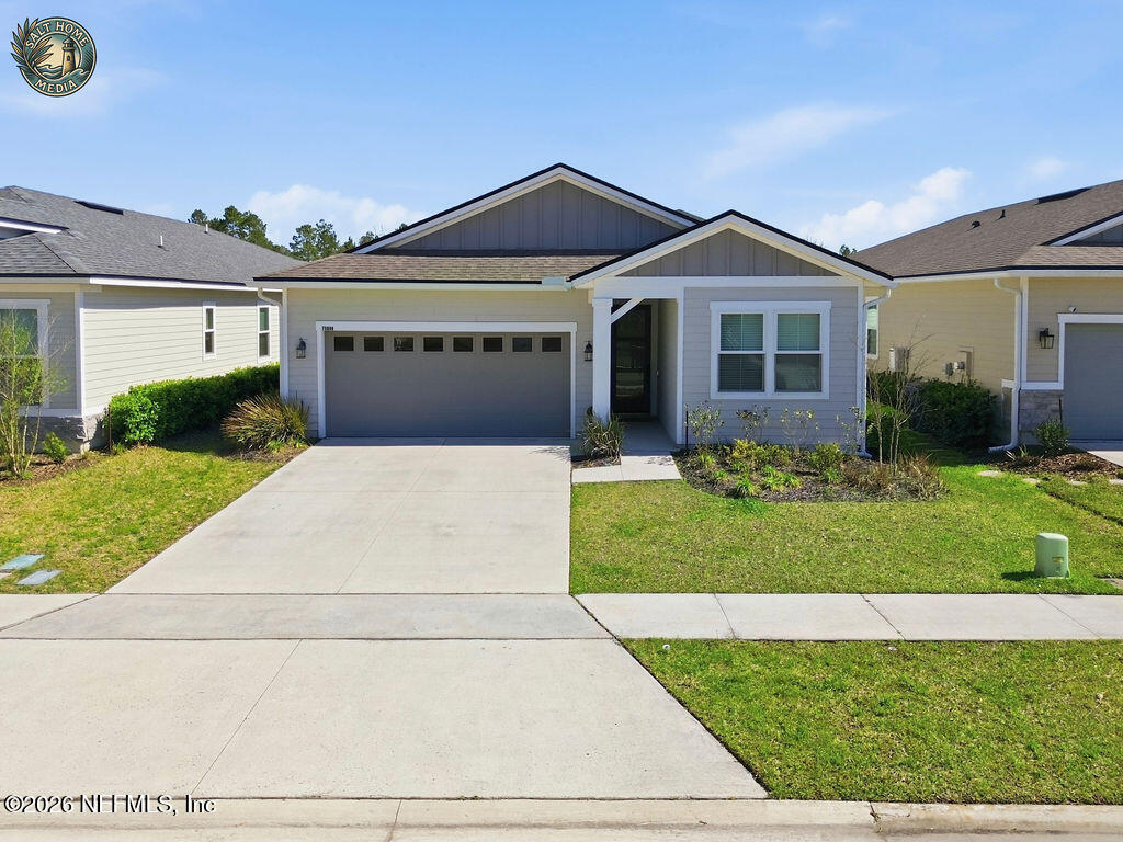 75888 Saffron Lane Yulee, FL 32097 - Photo 6 of 63 75888SaffronLnFrontExteriorDroneShot
