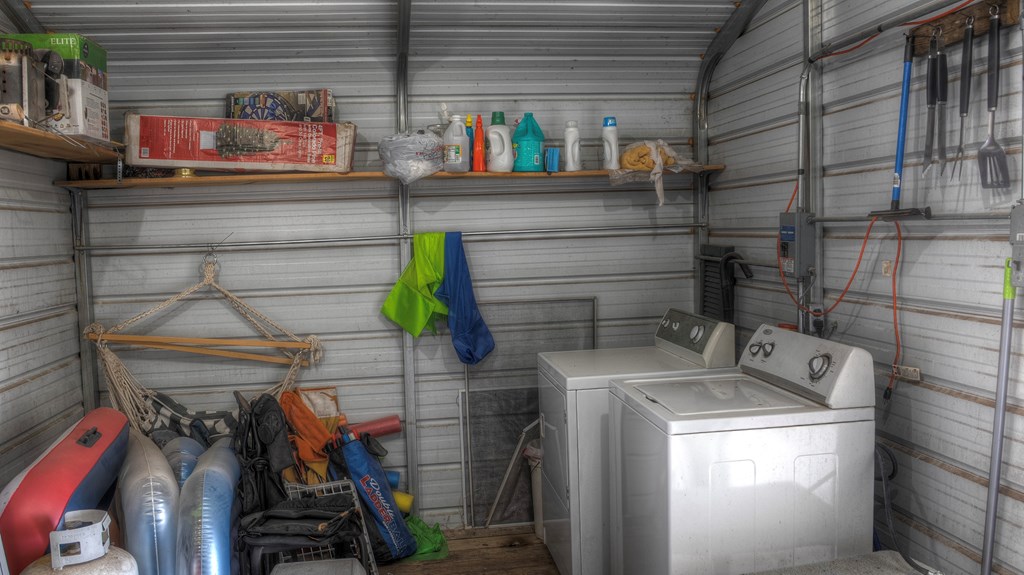 560 Pine Mountain Road Camp Wood, TX 78833 - Photo 27 of 38 a utility room with dryer and washer