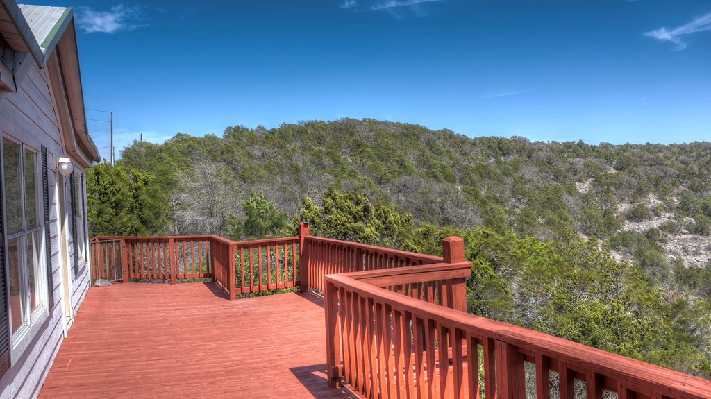 560 Pine Mountain Road Camp Wood, TX 78833 - Photo 3 of 38 a view of balcony with furniture