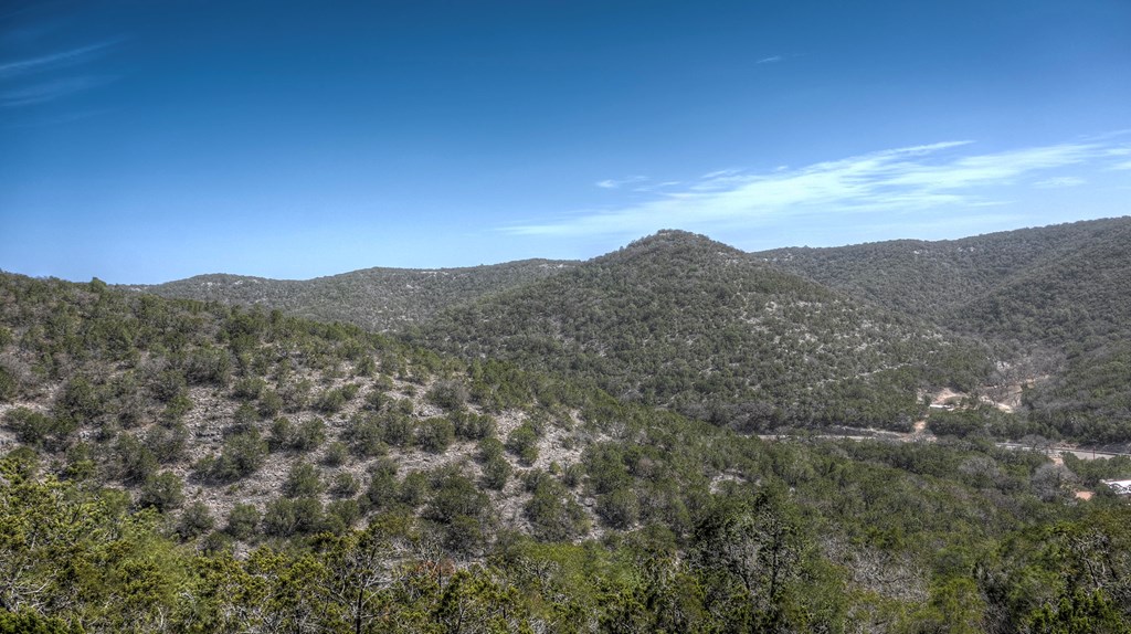 560 Pine Mountain Road Camp Wood, TX 78833 - Photo 6 of 38 a view of a mountain in the distance in a field