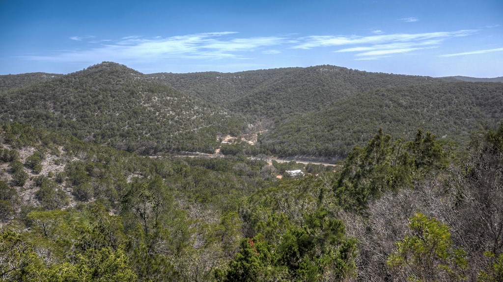 560 Pine Mountain Road Camp Wood, TX 78833 - Photo 7 of 38 a view of a mountain range with lush green forest