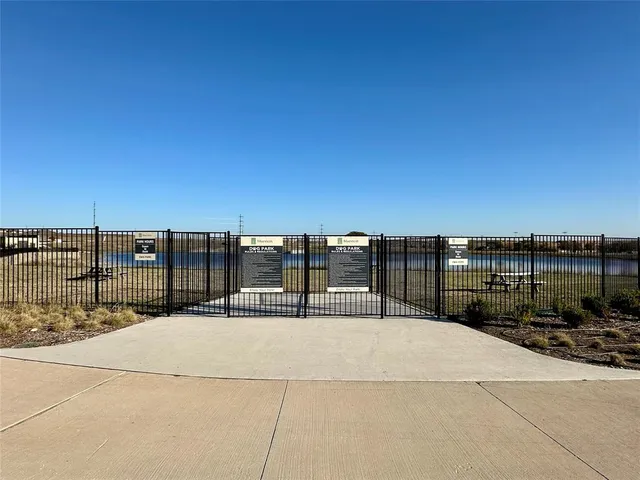 a view of swimming pool with outdoor seating