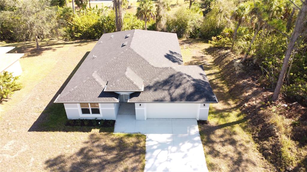 3082 Parade Terrace North Port, FL 34286 - Photo 15 of 18 a view of house with a yard